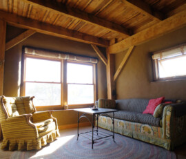 Hand-cut oak timber frame and clay plaster finishes