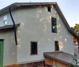 Lime plaster exterior with Keim mineral paint finish