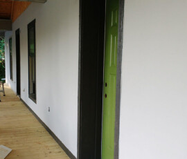 Lime plaster exterior with Keim mineral paint finish